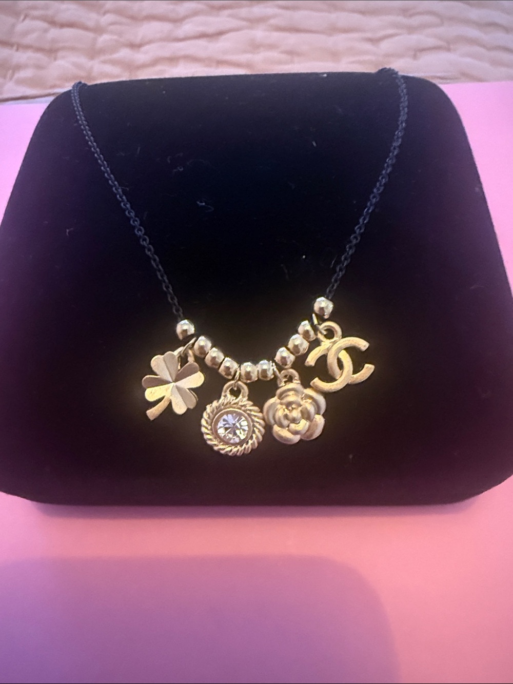 Gold Charm Chanel Necklace with Clover, Flower & Logo Accent